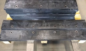 Picture of a rubberized carbide snow plow blade