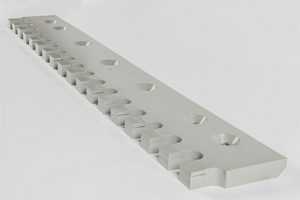 Picture of a serrated carbide snow plow blade.