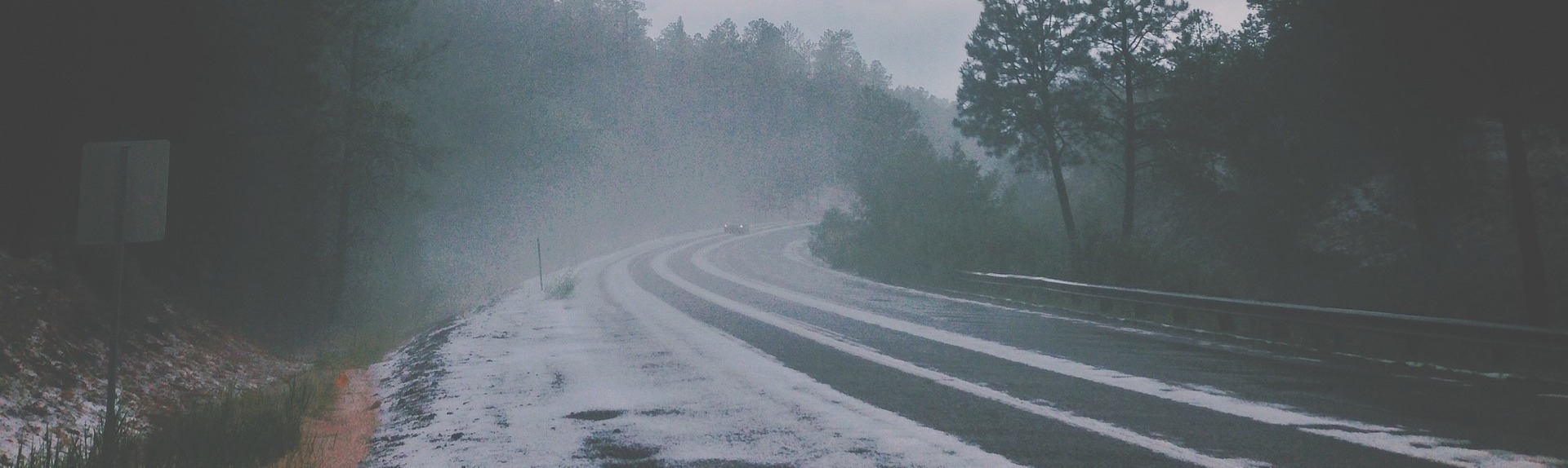driving snow storm dangerous road conditions