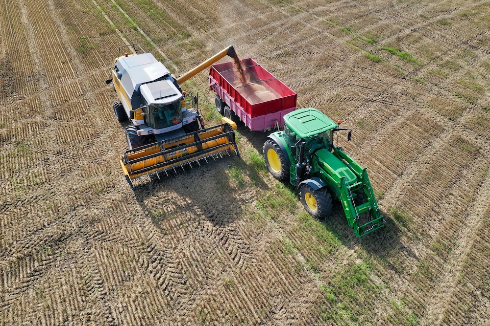 ag equipment types harvester and tractor